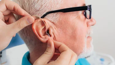 man with hearing aid
