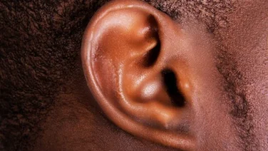 closeup of the outer ear of a man